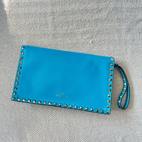 Valentino Garavani Rockstud leather clutch bag - Picture 1 of 7